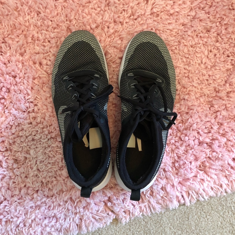 Black and grey Nike gym shoes